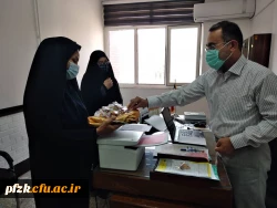 پذیرایی شیرینی از پرسنل اداری پردیس حضرت فاطمه الزهرا(س) اهواز به مناسبت اعیاد ربیع الاول