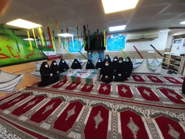 حضور کارکنان پردیس حضرت فاطمه الزهرا(س) در بنیاد حفظ آثار و نشر ارزش های دفاع مقدس برای بدرقه دو شهید تازه تفحص شده گمنام