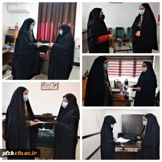 اهدای لوح تقدیر به مناسبت میلاد حضرت فاطمه الزهرا(س) به همکاران پردیس حضرت فاطمه الزهرا(س) اهواز